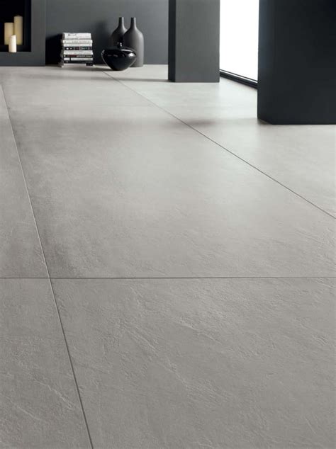 Cement look porcelain tile | Tile floor living room, Floor tile design, Modern floor tiles