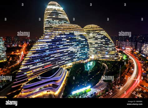 Wangjing Beijing SOHO city building night view Stock Photo - Alamy