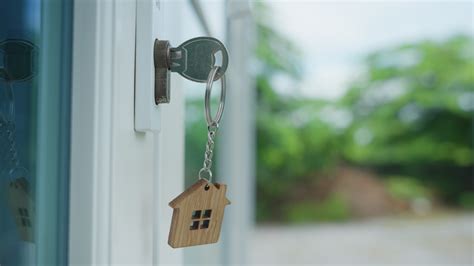 Landlord key for unlocking house is plugged into the door. Second hand ...