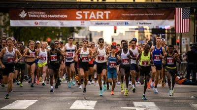 Photos: Thousands take part in 40th running of Twin Cities Marathon | MPR News