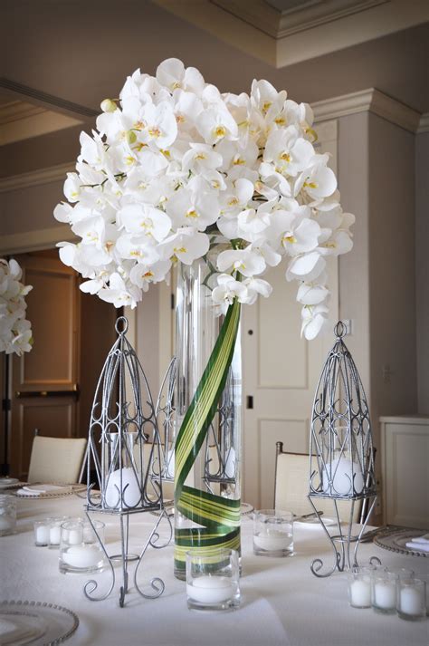 Orchid Centerpiece - i think we have a winner. | White flower arrangements, Flower arrangements ...