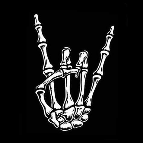 Rock on! | Skull hand tattoo, Rock hand, Skeleton hand tattoo