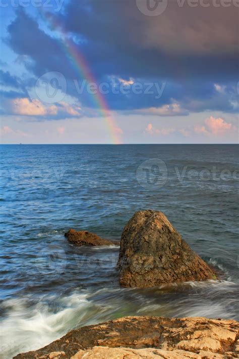 Rainbow over the tropical sea 1355070 Stock Photo at Vecteezy