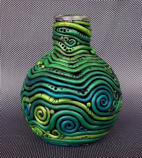 Clay coil vase | Coil pottery, Coil pots, Polymer clay art