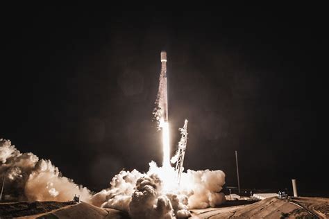 Elon Musk shows off SpaceX’s 60 internet-beaming satellites packed ...