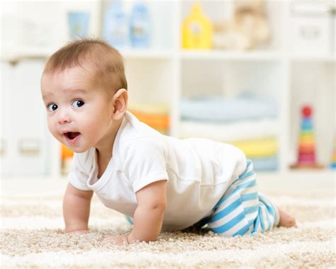 crawling baby boy indoors - Shaping Outcomes