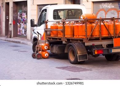 Gas Cylinder Delivery Images, Stock Photos & Vectors | Shutterstock