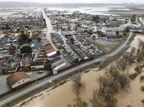 Pajaro River levee breach floods the community, with emergency responders scrambling to get ...