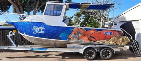 Fishing Boat Wraps and Signage - Custom Design and Installation Services