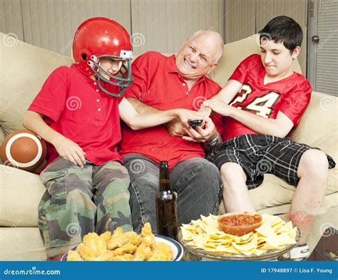 Football Fans Fight for Remote Stock Image - Image of child, people ...