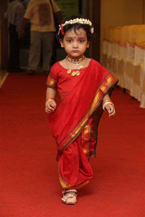 Baby girl in traditional maharashtrian nine yard saree Kids Saree, Baby ...