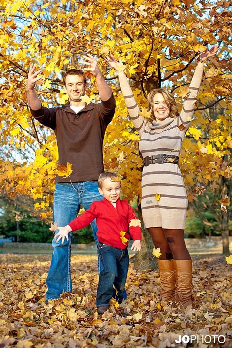 fall family photos with leaves | Fall photoshoot family, Fall family ...