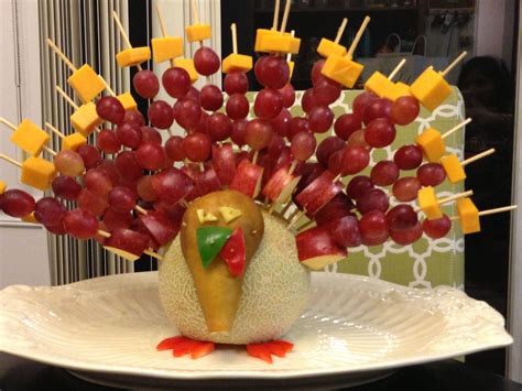 Fruit and cheese assembled into a turkey makes for a great classroom fall party centerpiece and ...