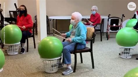 Seniors turn exercise into fun with drum sticks and stability balls
