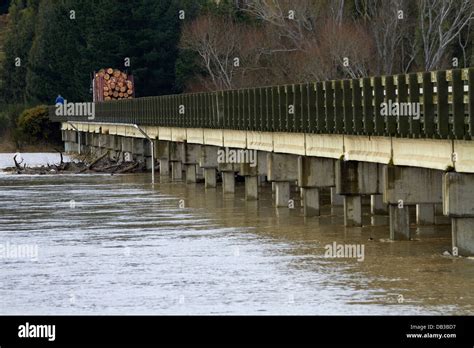 Flooded Taieri River and Taieri River Bridge near Henley, Taieri Plains, near Dunedin, South ...