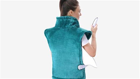 Stay warm with this wearable heating pad for $28 - CNET