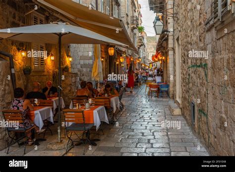 Dubrovnik, Croatia, July 26, 2020: Nightlife at a narrow street in the ...