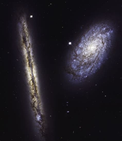 Hubble's Celebrates 27th Anniversary with Image of Spiral Galaxies NGC 4302 and NGC 4298