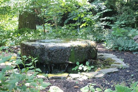 millstone fountain | Southern garden, Garden fountain, Garden art