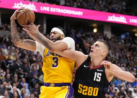 Jamal Murray guides the Denver Nuggets to a 101-99 victory over the Los Angeles Lakers - Sports ...