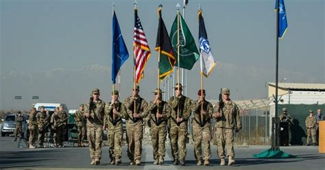 NATO Symbolically Lowers Flag in Afghanistan, But US War To March On ...