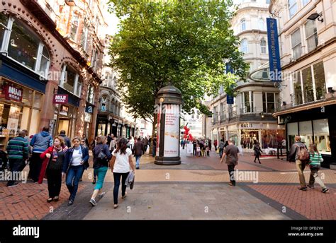 People shopping on a pedestrianised high street - New Street Stock ...