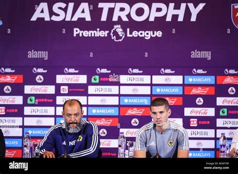 Head coach Nuno Espirito Santo, left, and Conor Coady of Wolverhampton Wanderers F.C. of English ...