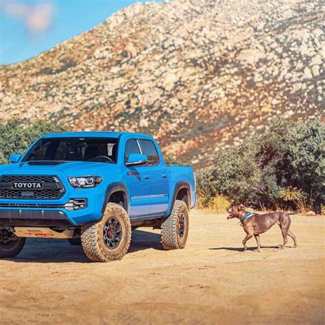 blue suv on brown dirt road during daytime - sliding puzzle on Sliding ...