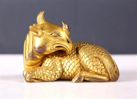 Chinese "Good Luck" Seated Animal in Gilt Bronze