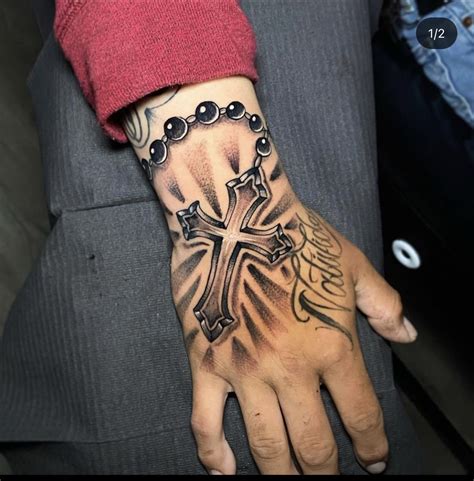 Pin on Heavenly* | Hand tattoos for guys, Tattoos for guys, Hand tattoos