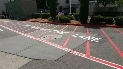 Custom Curb Painting, Handicap, ADA Upgrades, Crackfill, Patching | A & A Restriping