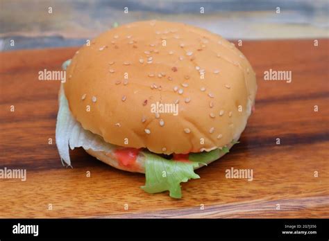 Cheese veggie burger Stock Photo - Alamy