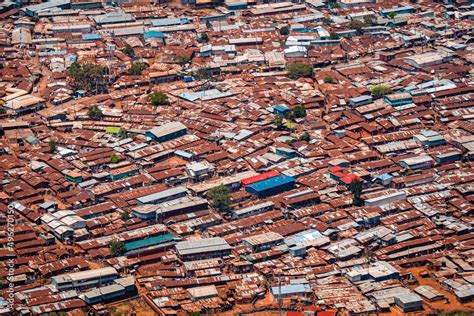 Aerial view of corrugated iron huts at the Nairobi downtown Kibera slum neighborhood, Nairobi ...