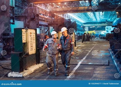 Workers in the Steel Mill. Factory Worker Takes a Sample for Metal. Stock Image - Image of ...