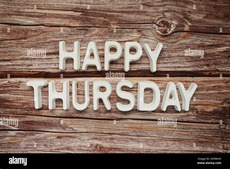 Happy Thursday text message on wooden background Stock Photo - Alamy