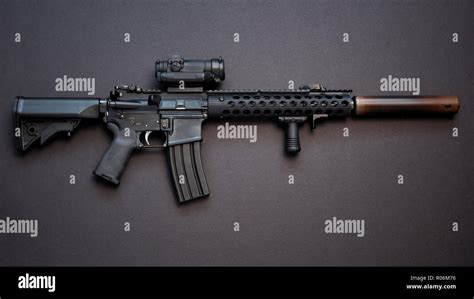 AR-15 assault rifle, also known as the M4 Carbine chambered in caliber ...