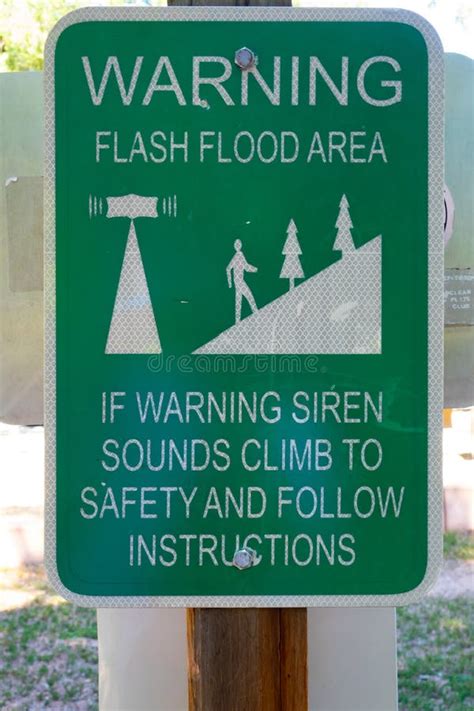 Warning Sign in a Flash Flood Area Stock Image - Image of warning ...