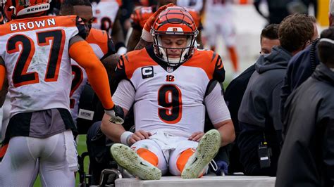 Bengals QB Joe Burrow carted off with knee injury, has initial diagnosis of torn ACL