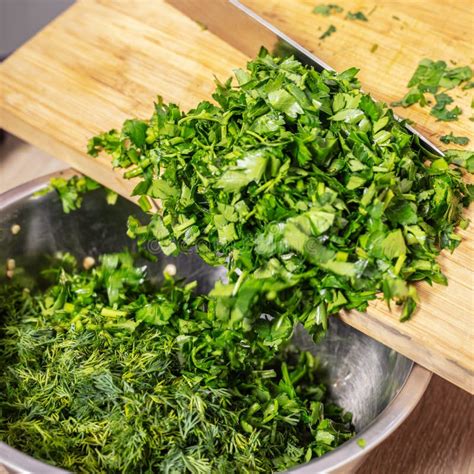 Chopped Parsley is Poured into a Bowl Stock Image - Image of lifestyle, parsley: 131425237