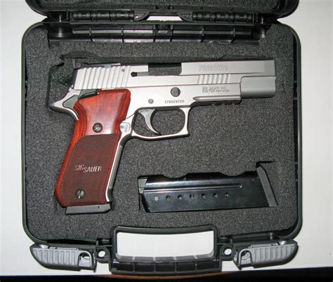 SIG P220: King of the Autos SIG Sauer Elite Stainless - SWAT Survival | Weapons | Tactics