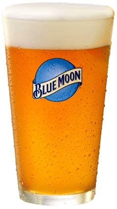 blue moon beer in a glass on a white background