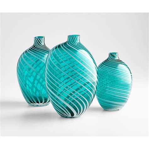 Cyan Design Medium Prague Vase. Details: - Finish: Teal Dimensions: - Overall: 6" w x 6" d x 10 ...