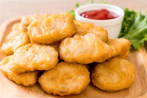 Chicken nuggets with sauce stock image. Image of tomato - 127039495