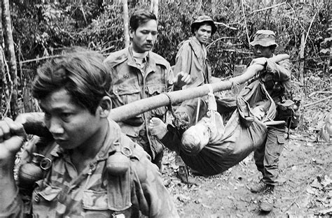Vietnam War 1974 - A wounded South Vietnamese soldier is c… | Flickr