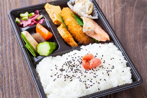 Traditional bento japanese cuisine — Stock Photo © Torsakarin #76414269