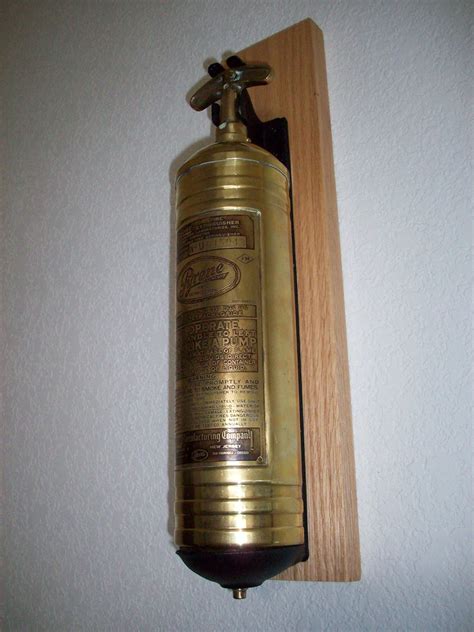 Small Fire Extinguisher | This is an old wall mount fire ext… | Flickr