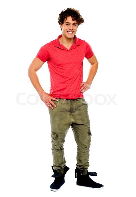 Guy posing with hands on his waist | Stock Photo | Colourbox