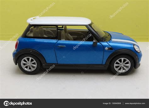 Light blue Mini Cooper car (2013 version) – Stock Editorial Photo © route66 #130840808