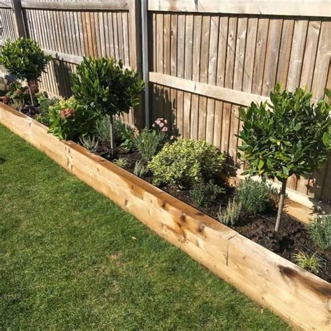 How To Build Raised Garden Bed Along Fence - Garden Design Ideas