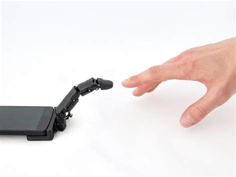 Smartphone robot finger lets devices crawl and touch users | The ...